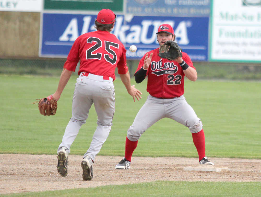 Peninsula Oilers shortstop Austin Piscotty flips the ball to infielder Mitchell Boggs to get the force at second base during a 5-3 loss to the Mat-Su Miners Friday, June 24, 2016, at Hermon Brothers Field in Palmer.