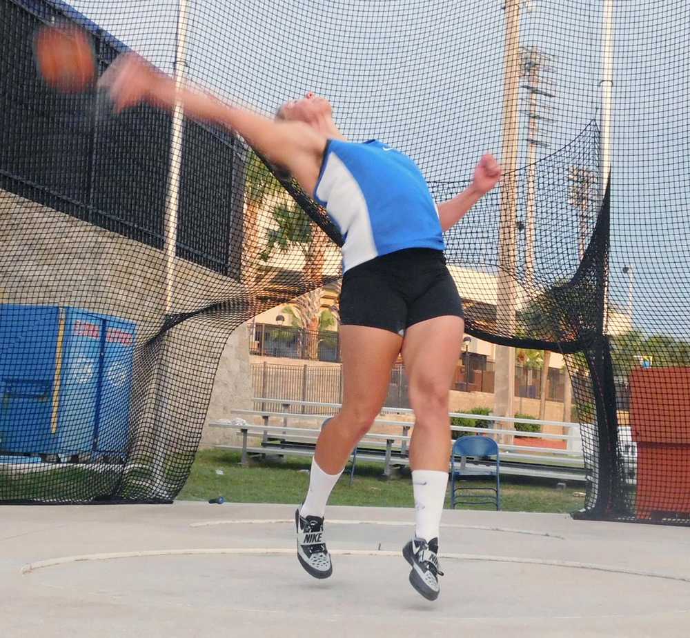 Photo by Karlee McQuillen/Peninsula Clarion Soldotna High School graduate Paige Blackburn practices the discus in Flordia recently.
