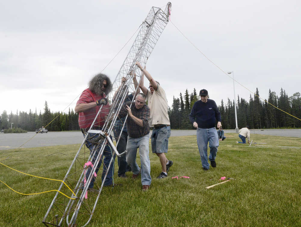 Photo by Ben Boettger/Clarion Peninsula George Van Lone of Soldotna's Moosehorn Amateur Radio Club listens for radio messages, attempting to exchange call signs with other operators, during ham radio field day on Saturday, June 25, 2016 in the parking lot of Skyveiw Middle School in Soldotna, Alaska. After seeking contacts for 24 hours, club members exchanged messages with 326 stations, including some in Hawaii, Connecticut, Florida, Texas, and Mexico.