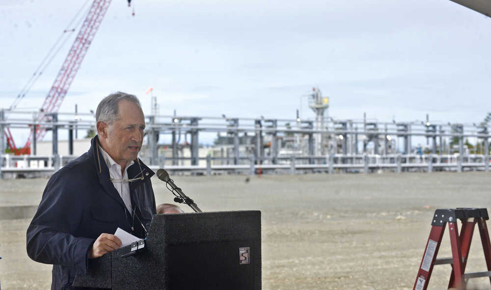 Ben Boettger/Peninsula Clarion BlueCrest Energy Chairman Bob Israel speaks during the ceremonial opening of BlueCrest Energy's Hansen Production Facility - visible in the background - on Saturday, June 25, 2016 at BlueCrest's wellpad north of Anchor Point, Alaska.