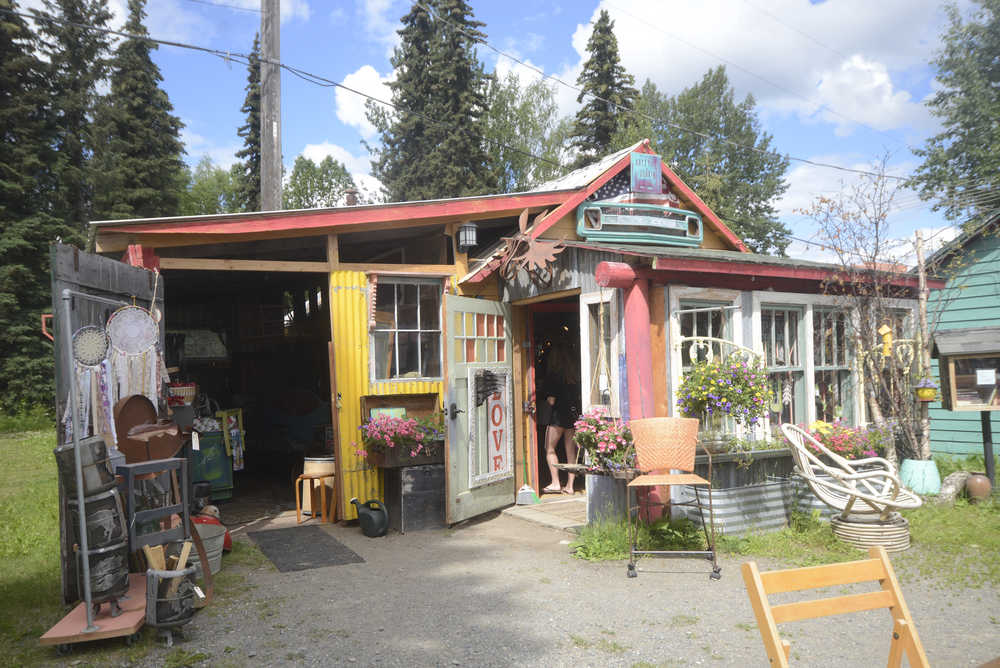 Photo by Megan Pacer/Peninsula Clarion Sue Mann, owner of Artzy Junk, picuted in this Tuesday, June 28, 2016 photo in Soldotna, Alaska, is one of several business owners working to foster a co-op in downtown Soldotna to promote local creation and enjoyment of art. The group will host a festival, Market Daze, on Thursday, July 21 on the property.