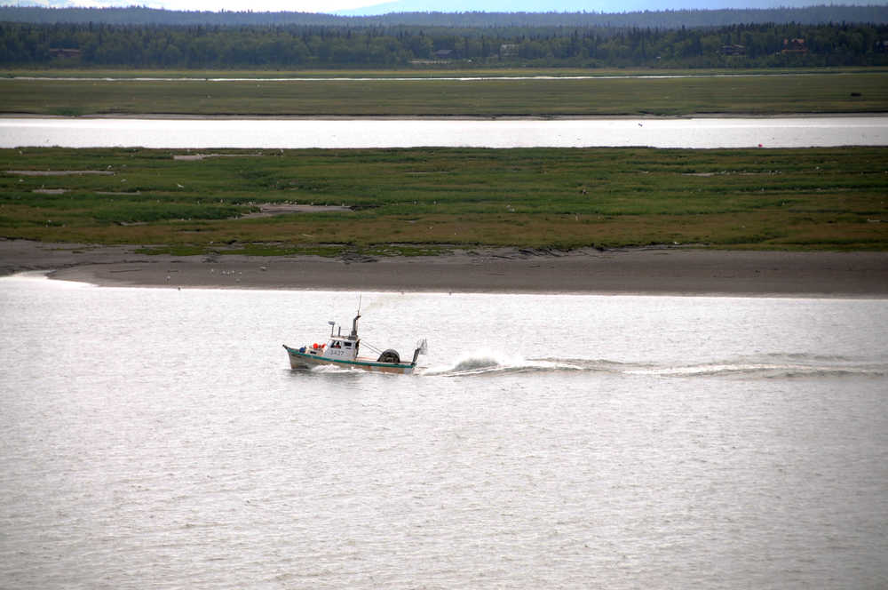 A fishing vessel enters the mouth of the Kenai River Thursday. The Alaska Department of Fish and Game is taking a conservative approach to managing the commercial fishery to start the season.
