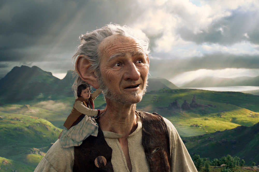 FILE - This image released by Disney shows Ruby Barnhill and the Big Friendly Giant from Giant Country, voiced by Mark Rylance, in a scene from"The BFG." "The Legend of Tarzan" and "The BFG" were both dwarfed by "Finding Dory" over the July 4th weekend, as the Pixar sequel led the box office for the third straight weekend. (Disney via AP, File)