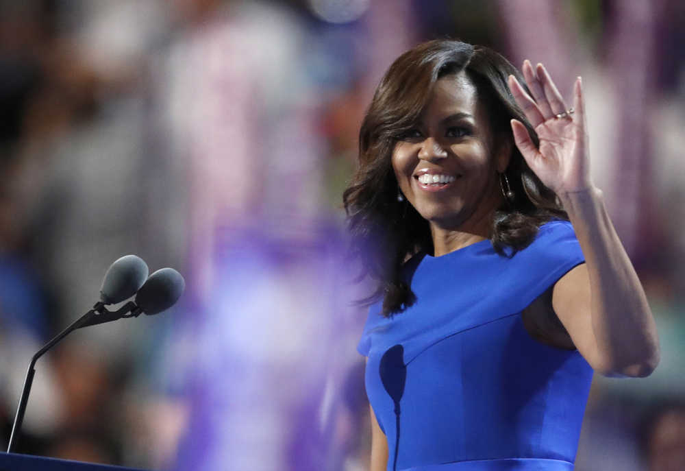 First Lady Michelle Obama takes the stage during the first day of the Democratic National Convention in Philadelphia , Monday, July 25, 2016. (AP Photo/Paul Sancya)