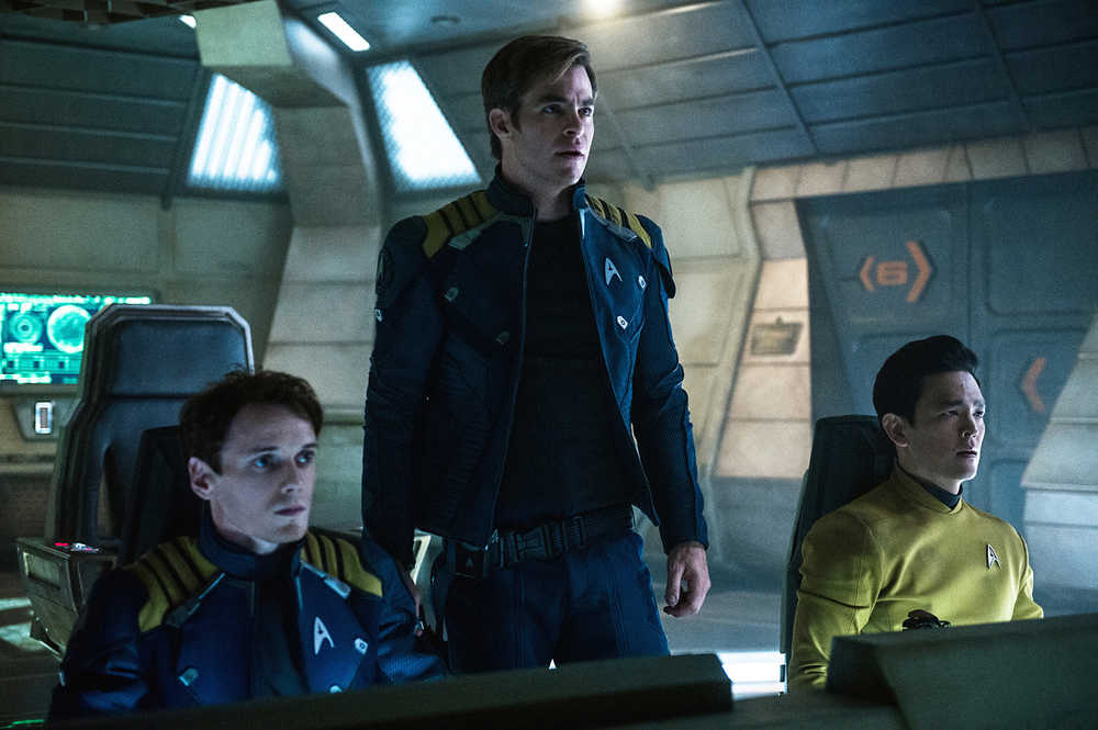 In this image released by Paramount Pictures, from left, Anton Yelchin, Chris Pine and John Cho appear in a scene from, "Star Trek Beyond." (Kimberley French/Paramount Pictures via AP)