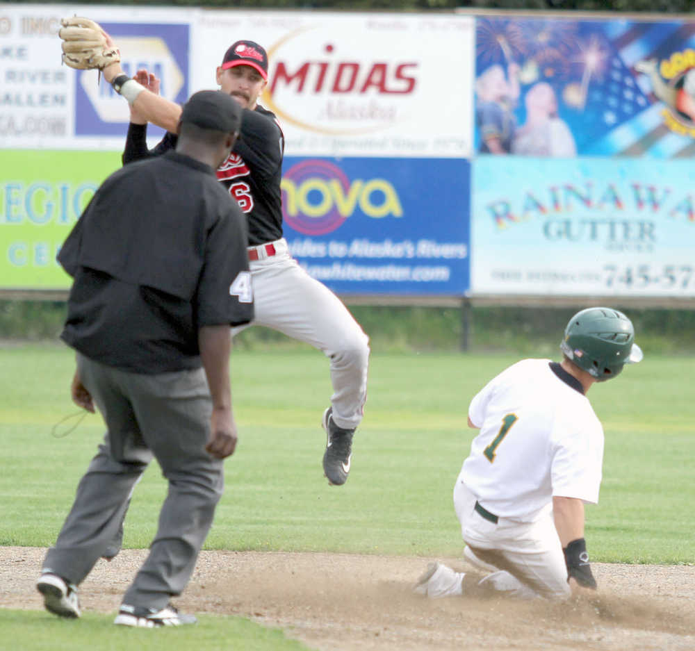 Peninsula infielder Jeffery Chapuran catches the throw high and tries to bring his glove down for the tag, as Mat-Su's Levi Jordan slides into second safely during a 3-2 win over the Oilers Wednesday, Aug. 3, 2016, at Hermon Brothers Field in Palmer.
