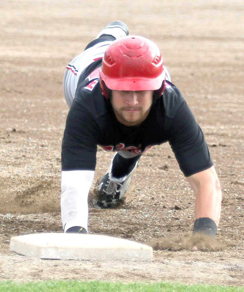 Peninsula's Trey Dawson slides back into first safely during a 3-2 win over the Mat-Su Miners Thursday, Aug. 3, 2016, at Hermon Brothers Field in Palmer.