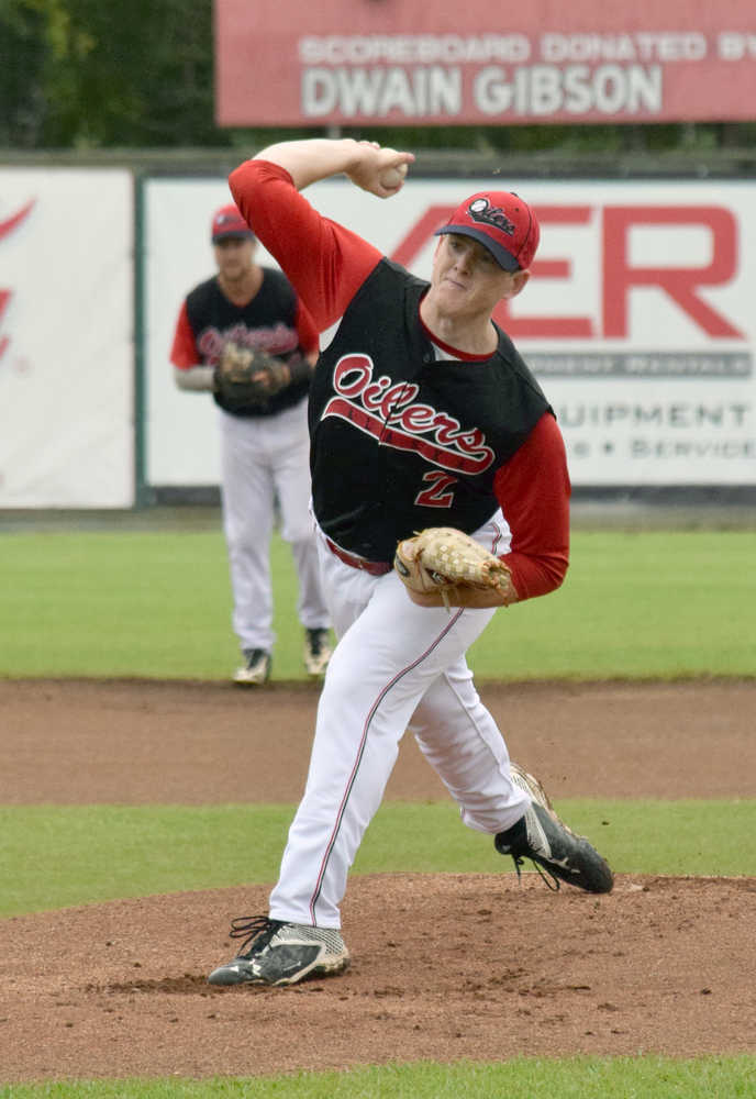 Photo by Jeff Helminiak/Peninsula Clarion Oilers starter and winner Billy Oxford delivers in the first inning of Friday's Top of the World Series semifinal at Coral Seymour Memorial Park in Kenai.