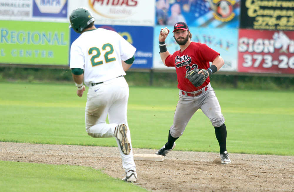 Mat-Su's Jake Scudder avoids the throw as Peninsula infielder Marshall Boggs turns the double play during a 9-4 Oilers loss to Mat-Su Sundy, Aug. 7, 2016, in the Alaska Baseball League Top of the World Series. The Miners clinched the 2016 ABL title with the win.