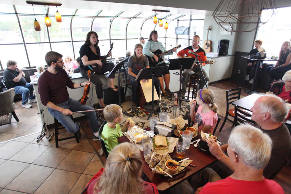 Photo by Kelly Sullivan/ Peninsula Clarion Recess Duty performs at Odie's Deli during the Kenai Peninsula Orchestra's NoonTime Tunes Concert Series, which is part of the KPO's Summer Music Festival on Tuesday, Aug. 9, 2016 in Soldotna, Alaska.