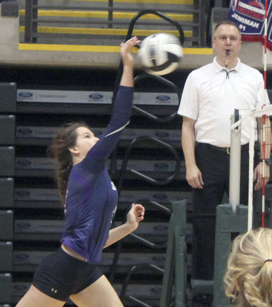 Photo by Joey Klecka/Peninsula Clarion Soldotna hitter Judah Aley, now a senior, spikes the ball at the Class 4A state volleyball tournament Nov. 13, 2015, in Anchorage.