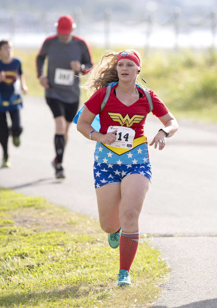 Amy Drake is a Wonder Woman as she runs in Saturday's CASA Superhero 5-kilometer to benefit the Kenaitze Indian Tribe's Court Appointed Special Advocates program.