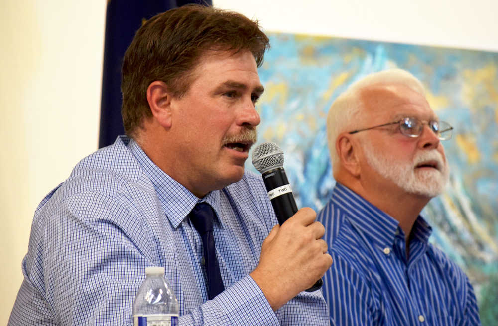 Ben Boettger/Peninsula Clarion Kenai mayoral candidates Brian Gabriel (left) and Hal Smalley take turns answering questions during a debate at the Kenai Chamber of Commerce luncheon on Wednesday, Aug. 24, 2016 in Kenai, Alaska.