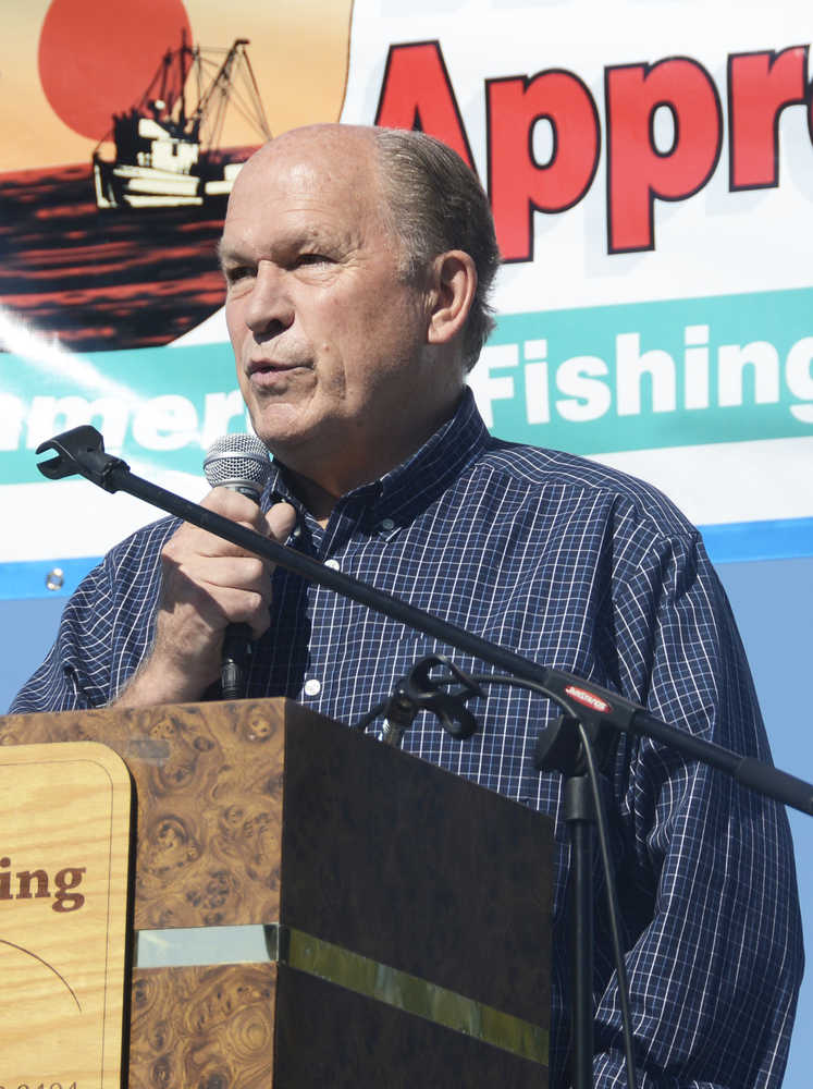 Photo by Megan Pacer/Peninsula Clarion Attendees of Industry Appreciation Day applaud Gov. Bill Walker during his visit Saturday, Aug. 27,2016 in Kenai, Alaska. Walker is making stops across the state to speak about Alaska's fiscal situation.