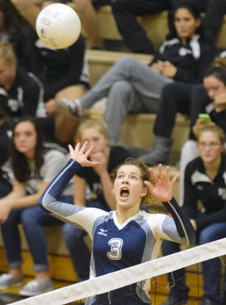 Photo by Jeff Helminiak/Peninsula Clarion Soldotna's Ella Stenga attacks against Kenai Central on Saturday in Nikiski in the final of the ninth annual Shayna Pritchard Memorial Volleyball Tournament.