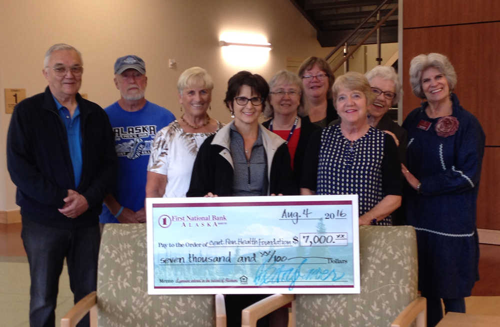 First National Bank Alaska recently made a contribution of $7,000 to the Central Peninsula Health Foundation's Patient Assistance Fund. Pictured from left: Ed Krohn, President Central Peninsula Health Foundation; Jim Bennett, Board Member, Central Peninsula Health Foundation; Trena Richardson, President, Central Peninsula General Hospital, Inc.; Lore Weimer, FNBA Spouse; Kathy Gensel, Foundation Director, Central Peninsula Health Foundation; Mary Tougas, FNBA Spouse; Suzie Longacre, FNBA Spouse; Agnes Coyle, FNBA Spouse; and Sheila Barrett, FNBA Spouse.