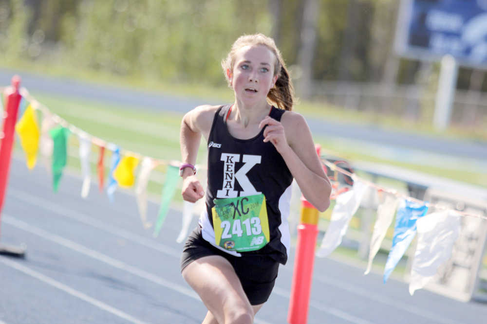 Kenai Central's Riana Boonstra sprints to the finish during the 4A girls' race of the Palmer Invitational Saturday, Sept. 3, 2016, at Palmer High School. Boonstra was the runner-up in the race, with a time of 19:22.