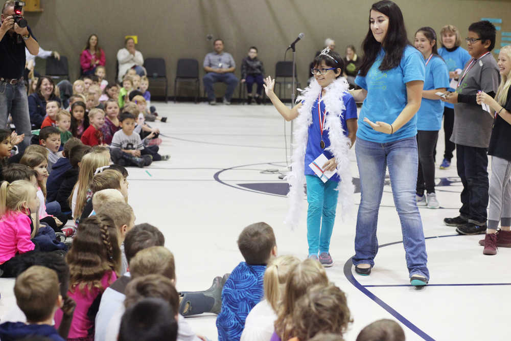 Photo by Kelly Sullivan/ Peninsula Clarion Anna Gilliam was crowned Reading Is Great in Summer, or RIGS, queen this year for reading 17,592 minutes during the annual assembly Friday, Sept. 16, 2016 at Kalifornsky Beach Elementary School in Soldotna, Alaska.