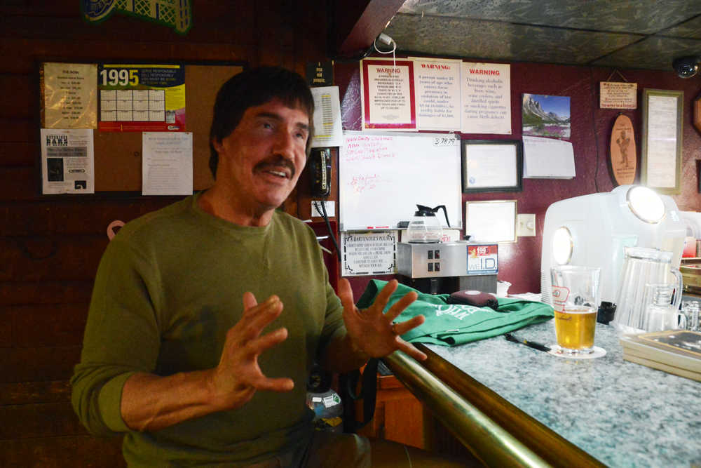 Photo by Megan Pacer/Peninsula Clarion Doug Vandergraft, author of 'A Guide to the Notorious Bars of Alaska,' speaks about his research, favorite bars and more Friday, Sept. 16, 2016 at the Bow Bar in Kenai, Alaska. Vandergraft researched for the book for 14 year in Alaska and Washington D.C.