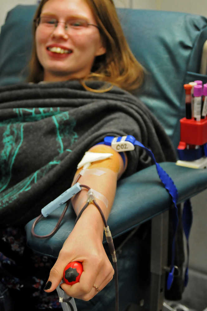 Photo by Elizabeth Earl/Peninsula Clarion Melanie Lee, 17, walked over from Kenai Central High School to give blood at the Blood Bank of Alaska's mobile donation clinic Thursday, Sept. 22, 2016 in Kenai, Alaska. The Anchorage-based Blood Bank of Alaska, which periodically makes trips to other areas of Alaska to allow residents of other communities to donate blood, will hold another blood drive between 8 a.m. and 3 p.m. Friday at Central Peninsula Hospital in Soldotna.