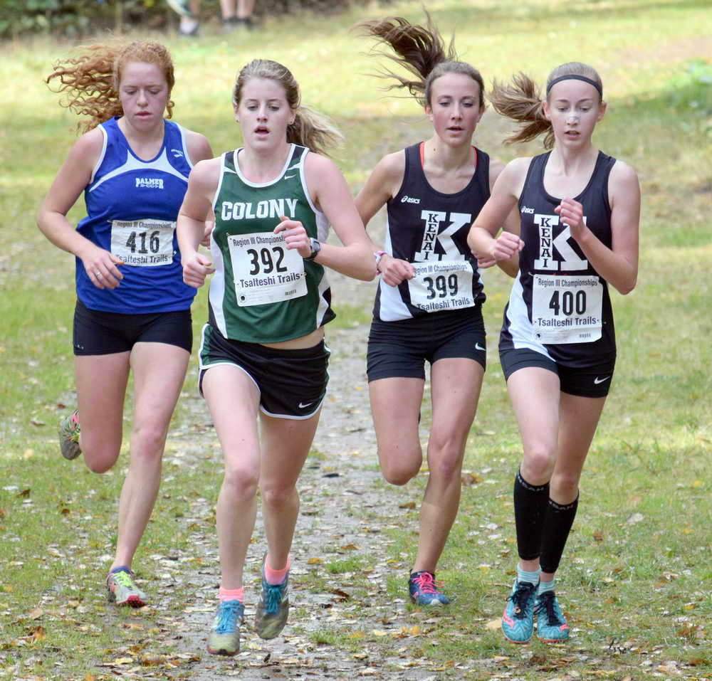 Photo by Jeff Helminiak/Peninsula Clarion Palmer's Ruby Woodings, Colony's Jill Bowker and Kenai Central's Riana Boonstra and Jaycie Calvert make up the lead pack a little over a kilometer from the finish in the Class 4A girls race at the Region III meet at Tsalteshi Trails. Woodings won the race, and Boonstra and Calvert led the Kardinals to the team title.