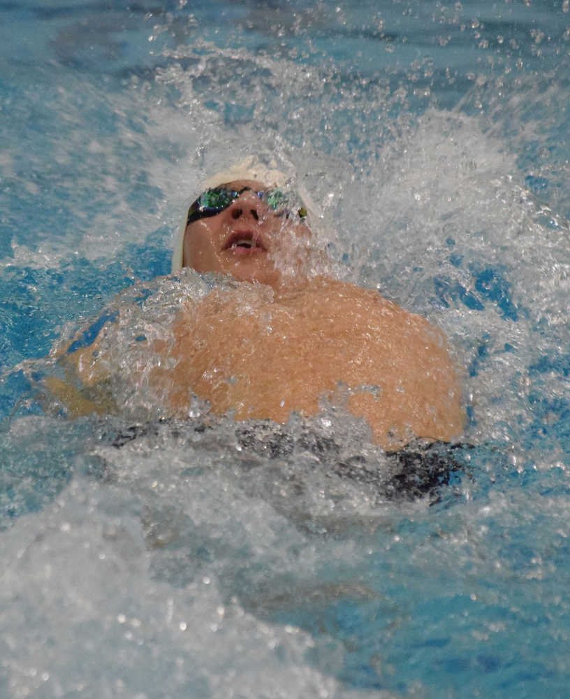 Photo by Joey Klecka/Peninsula Clarion Soldotna senior Cody Watkins backstrokes in the boys 50-yard IM Friday at the SoHi Pentathlon in Soldotna.