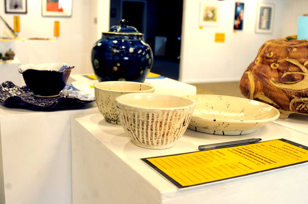 Photo by Elizabeth Earl/Peninsula Clarion Pottery stands on display at the Kenai Fine Arts Center on Tuesday, Sept. 27, 2016 in Kenai, Alaska. The pottery and a collection of other pieces will be up for sale at the Peninsula Art Guild's annual Harvest Art Auction fundraiser Saturday, Oct. 1, 2016.