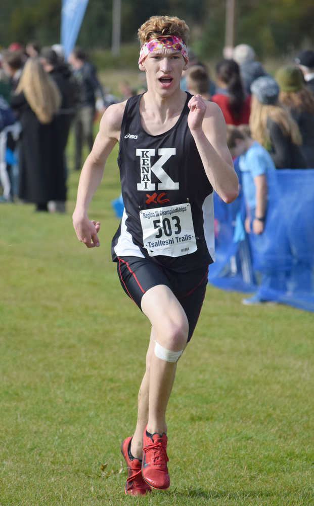 Photo by Jeff Helminiak/Peninsula Clarion Kenai Central junior Braden Olsen finishes seventh Saturday at the Region III meet at Tsalteshi Trails to qualify for Saturday's state meet.