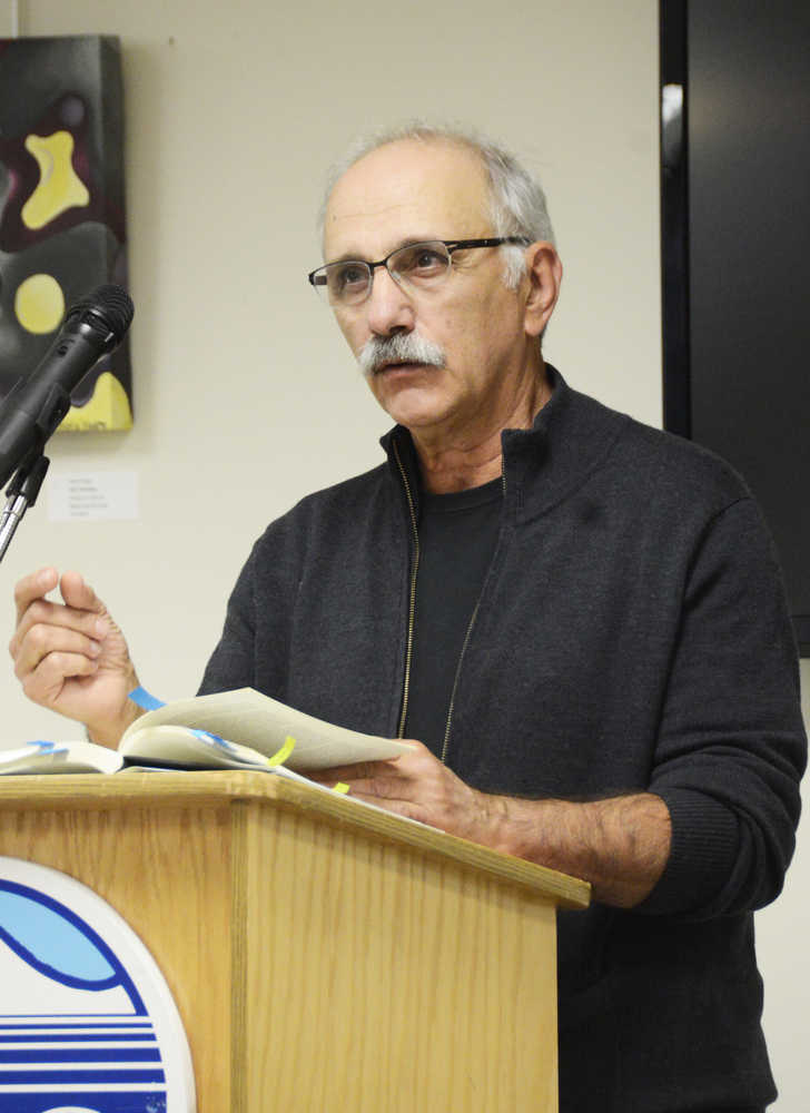 Photo by Megan Pacer/Peninsula Clarion Author Richard Chiappone shares excerpts from his book, "Liar's Code: Growing Up Fishing," which was published this year, during a Kenai Peninsula College Showcase event Wednesday, Oct. 5, 2016 at Kenai Peninsula College in Soldotna, Alaska. Chiappone also teaches writing at the University of Alaska Anchorage Master of Fine Arts Program.