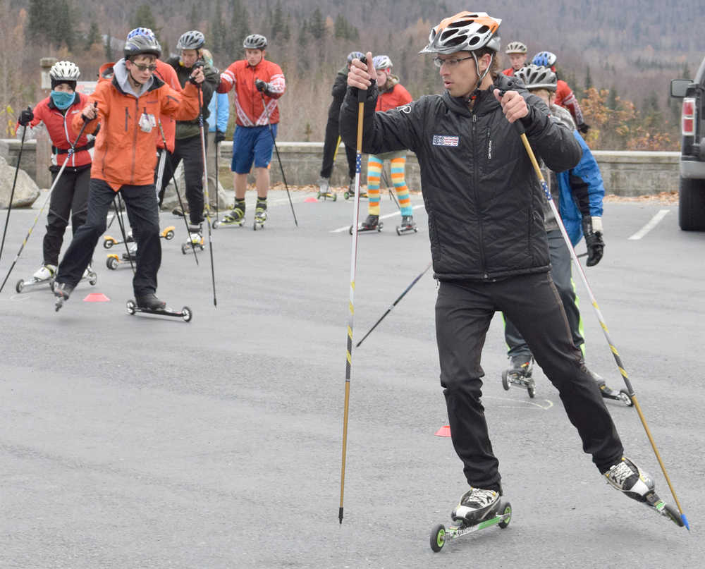 Photo by Jeff Helminiak/Peninsula Clarion A Kenai Central athlete practices roller-skiing Sunday morning near the Hope Highway junction just off the Seward Highway.