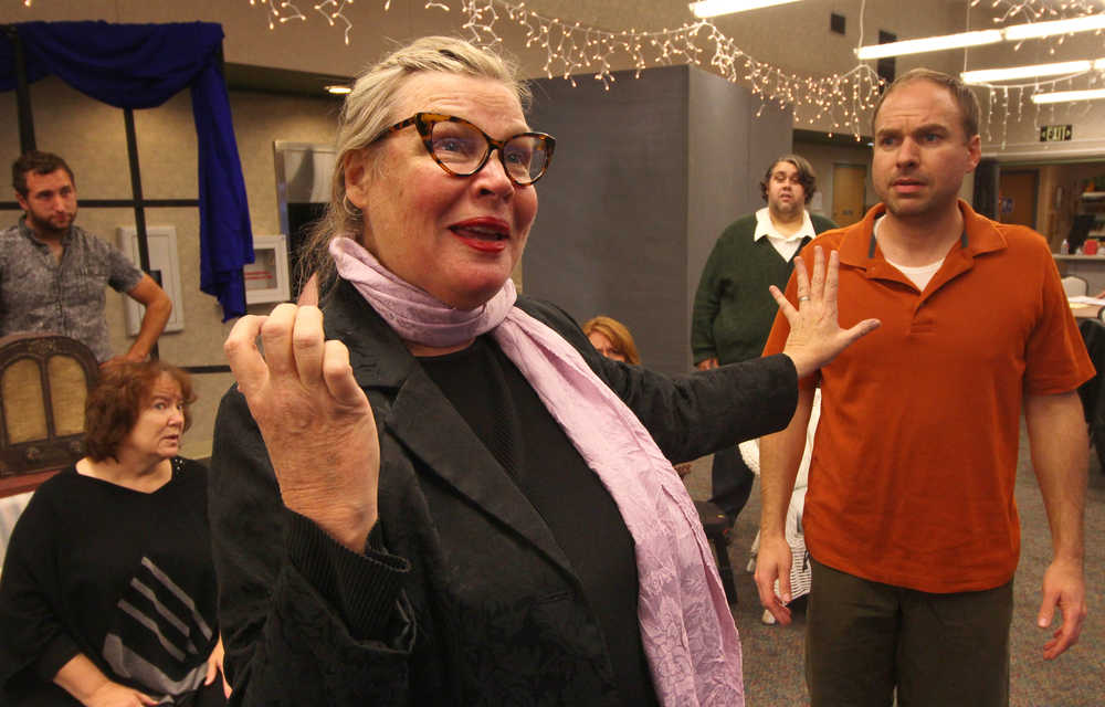 Ben Boettger/Peninsula Clarion Terri Zopf-Shoessler, in the role of playwright Olivia Davis-Bascombe, expounds her idea for a murder mystery to skeptical cast members (left to right) Daniel Rozak, Terri Burdick, Ian McEwen, and Jamie Nelson during a dress rehearsal of Mike Druce's dinner theater production "The Show Can't Go On (But it must)" on Wednesday, Oct. 12 at the Kenai Senior Center.