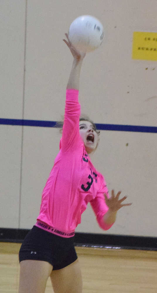 Photo by Joey Klecka/Peninsula Clarion Soldotna outside hitter Ella Stenga bats the ball towards the Seward side Tuesday night at the Soldotna Prep gym.