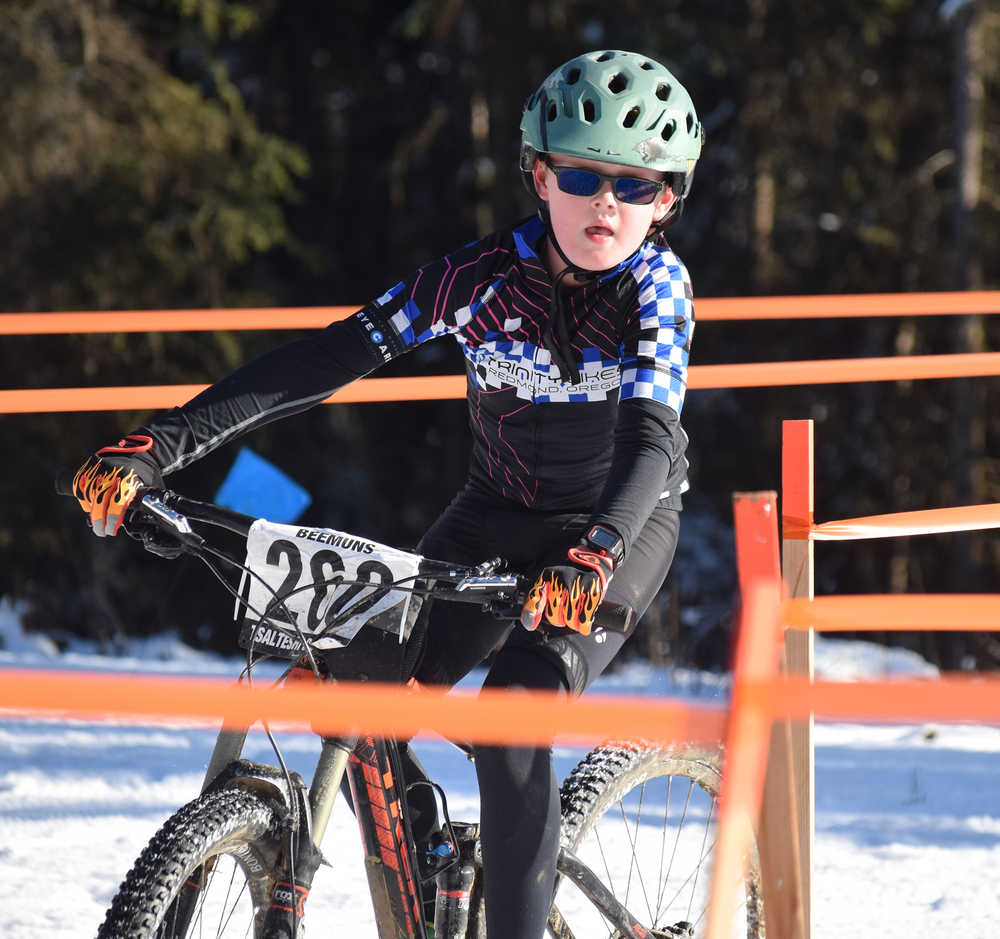 Photo by Joey Klecka/Peninsula Clarion Landon Showalter rounds the tape Saturday afternoon on the Tsalteshi Trails.