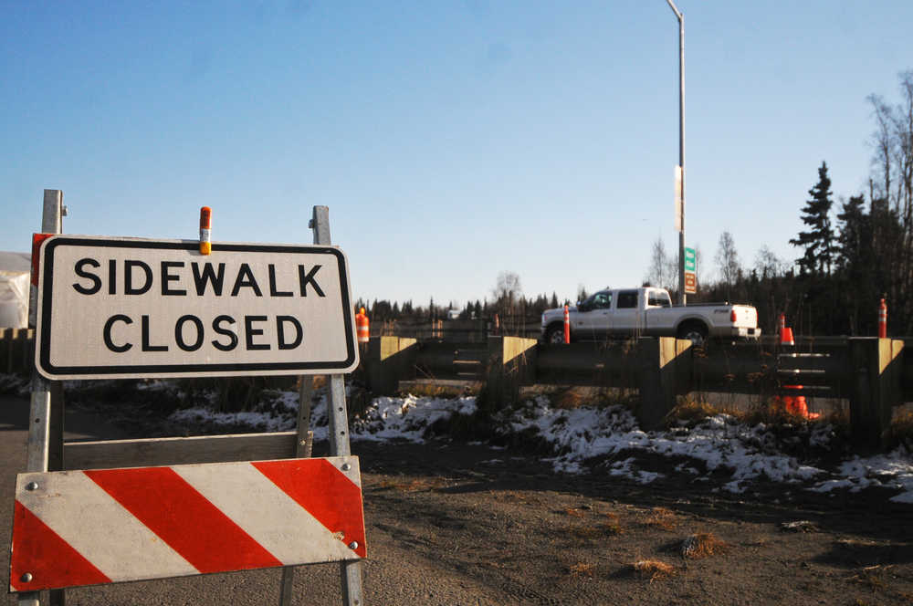 Photo by Elizabeth Earl/Peninsula Clarion Drivers make their way across the Sterling Highway bridge over the Kenai River on Sunday, Oct. 23, 2016 in Soldotna, Alaska. The Alaska Department of Transportation and Public Facilities is conducting repairs on the bridge over the river and has reduced traffic to one lane in either driection. The repairs are scheduled to be finished by Monday, Oct. 31, according to Alaska 511.