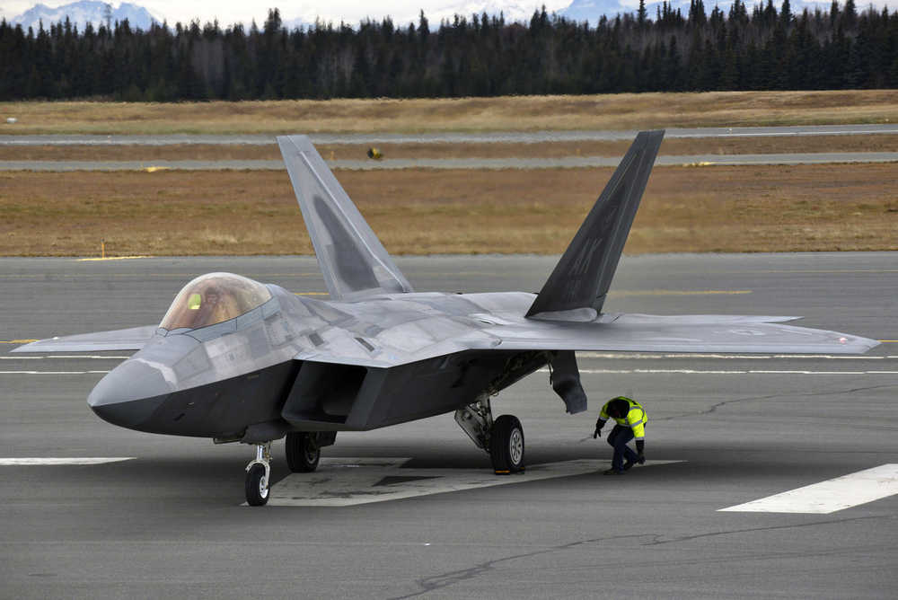 Photo by Ben Boettger/Peninsula Clarion An F-22 Raptor fighter jet takes off from the Kenai airport on Friday, Oct. 28, 2016.