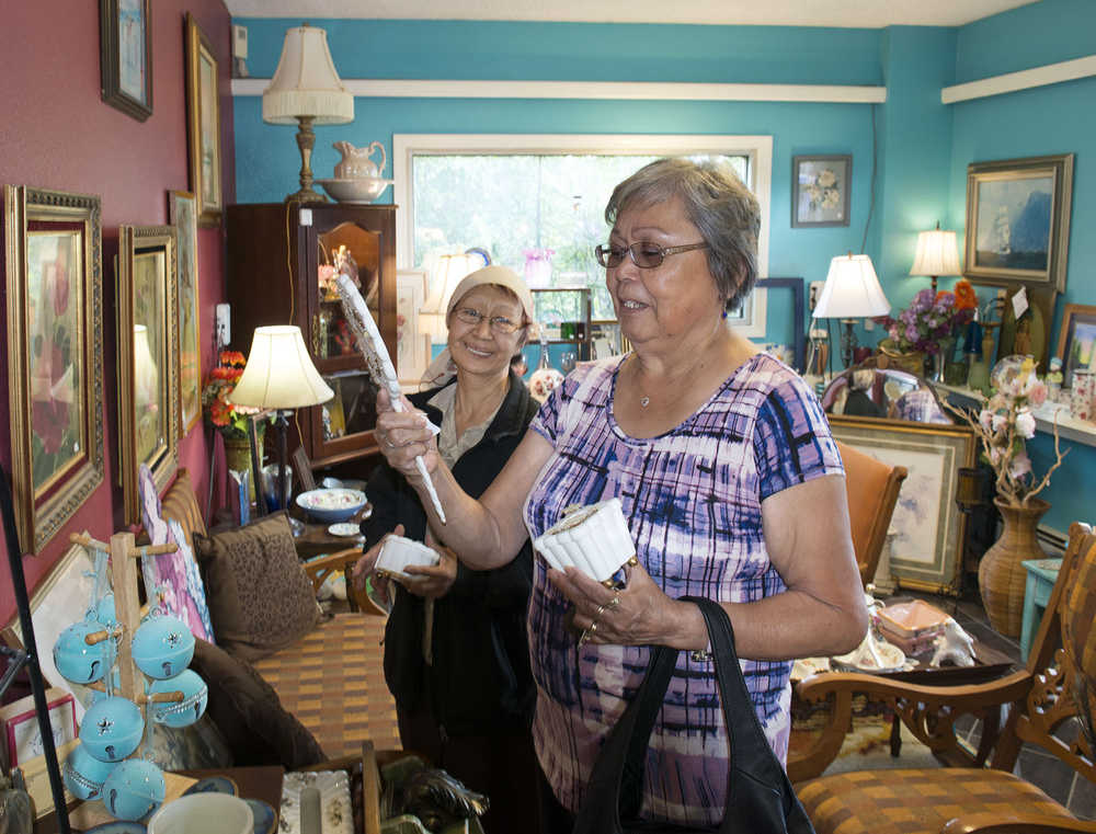 Photo courtesy Kenaitze Indian Tribe In this Aug. 23, 2016, Nancy Nelson (left) and Laura Hobson look at antiques in a curio store during a shopping trip the two women shared in Kenai, Alaska. Both are participating in the Kenaitze Indian Tribe's Senior Companion Program.