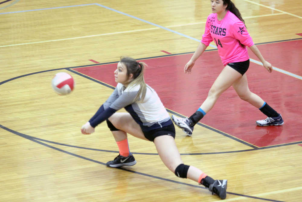 Soldotna defensive specialist Taylor Earl picks up the dig during a 3-1 loss to Palmer on the opening day of the Northern Lights Conference Chamoionships, Thursday, Nov. 3, 2016, at Wasilla High School.