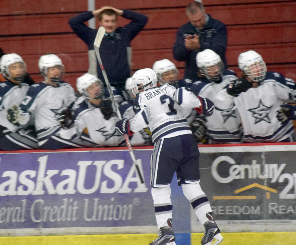 Photo by Jeff Helminiak/Peninsula Clarion Soldotna's Galen Brantley III celebrates his game-winning goal against Homer on Friday at the Soldotna Regional Sports Complex in the Peninsula Ice Challenge.