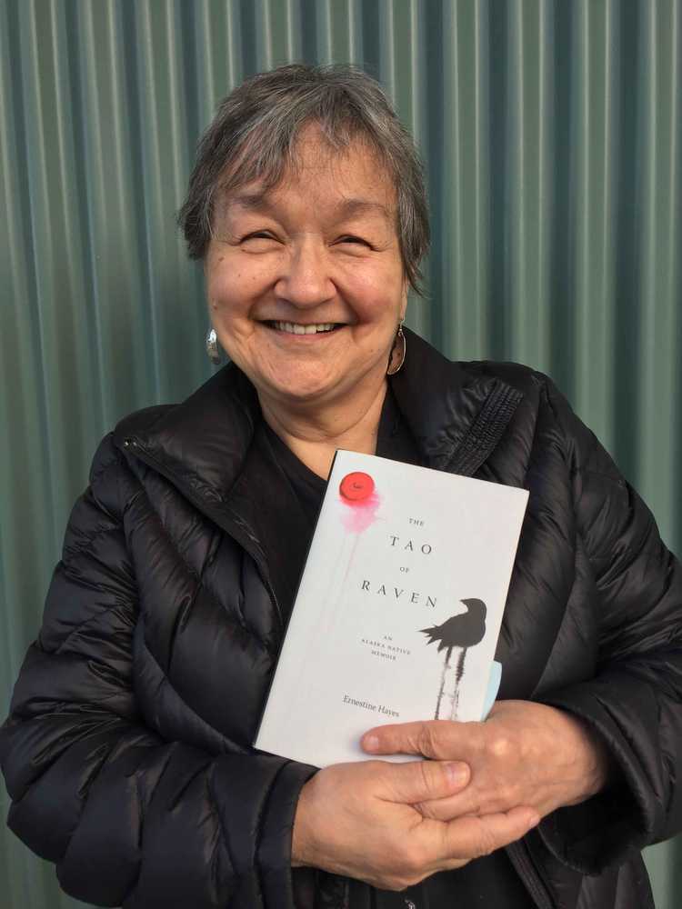 Author Ernestine Hayes holds her latest book "The Tao of Raven: An Alaska Native Memoir." (Photo by Mary Catharine Martin/Capital City Weekly)