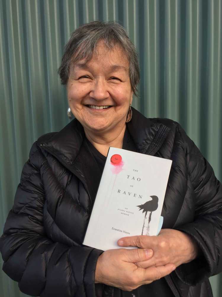 Author Ernestine Hayes holds her latest book "The Tao of Raven: An Alaska Native Memoir." (Photo by Mary Catharine Martin/Capital City Weekly)