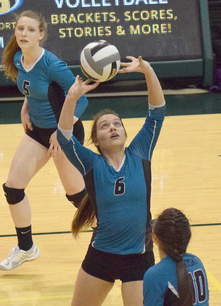 Photo by Joey Klecka/Peninsula Clarion Nikiski's Emma Wik (6) sets up a pass against Mt. Edgecumbe Friday evening at the Class 3A state volleyball tournament at the Alaska Airlines Arena in Anchorage.