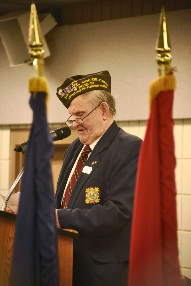 Ben Boettger/Peninsula Clarion Korean War veteran Herb Stettler gives his annual reading of the World War One memorial poem "Flanders Field" during a Veteran's Day ceremony on Friday, Nov. 11, 2016 at the Soldotna Regional Sports Complex in Soldotna.