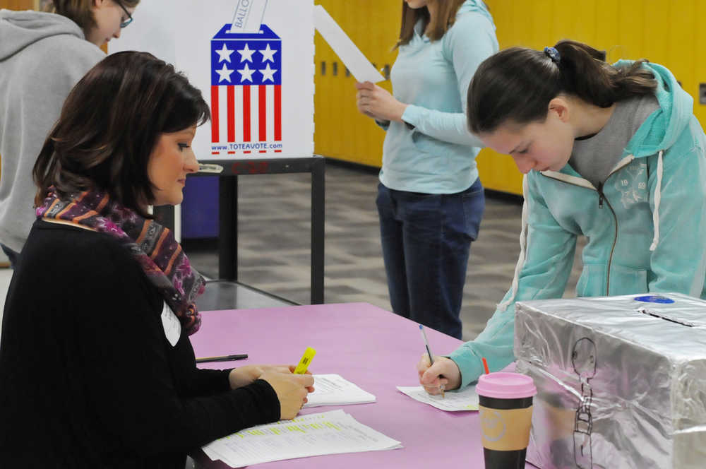 Photo by Elizabeth Earl/Peninsula Clarion Students from Bob Summer's U.S. History class at Kenai Middle School got the chance to cast their ballots in a mock election held Tuesday, Nov. 8, 2016 in Kenai, Alaska. The students learned about the electoral college system and filled out sample ballots for U.S. President and senator and Congressman from Alaska.