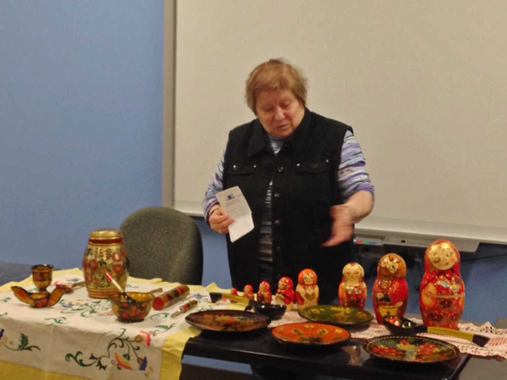 Photo courtesy Bridget Clark Natasha Weissenberg presents pieces of art from her home country of Moldova during an English as a Second Language conversation group at Kenai Peninsula College on Thursday, Nov. 10, 2016 in Soldotna, Alaska.