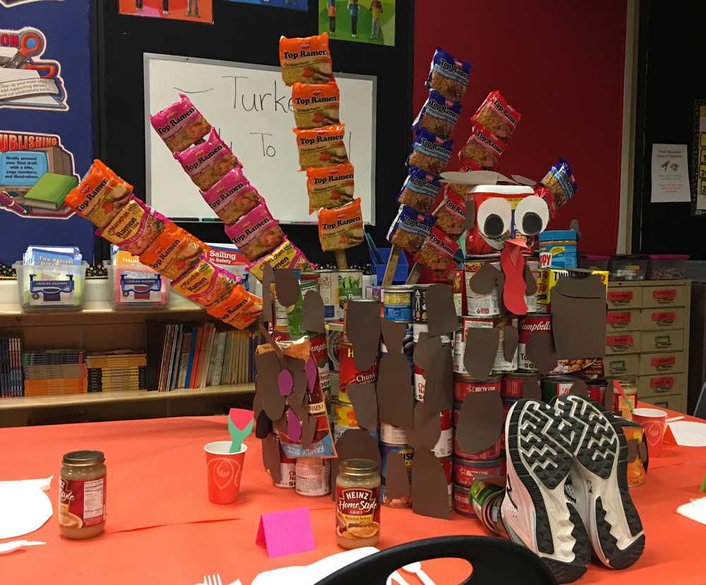 This turkey sculpture was created by students in Andrea Joachim's class at Redoubt Elementary School in Soldotna using food items brought in by students for the school's "Canstruction" competition Thursday. Food items collected during the event will be donated to the Kenai Peninsula Food Bank. (Photo by Will Morrow/Peninsula Clarion)
