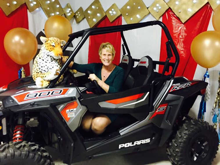 Donna Peterson was the lucky winner of an ATV Side by Side  at Boys & Girls Club Gala.
