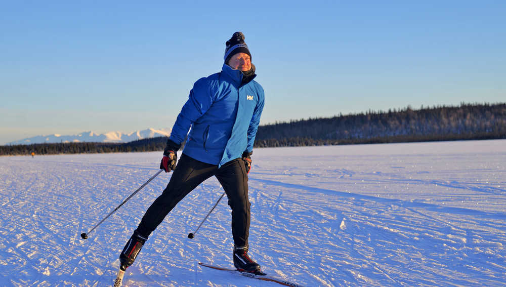 Photo by Ben Boettger/Peninsula Clarion Kenai Wildlife Refuge ecologist Mark Laker takes an afternoon ski on the Refuge's frozen Headquarters Lake on Tuesday, Nov. 29 near the Kenai Wildlife Refuge Visitors Center in Soldotna.