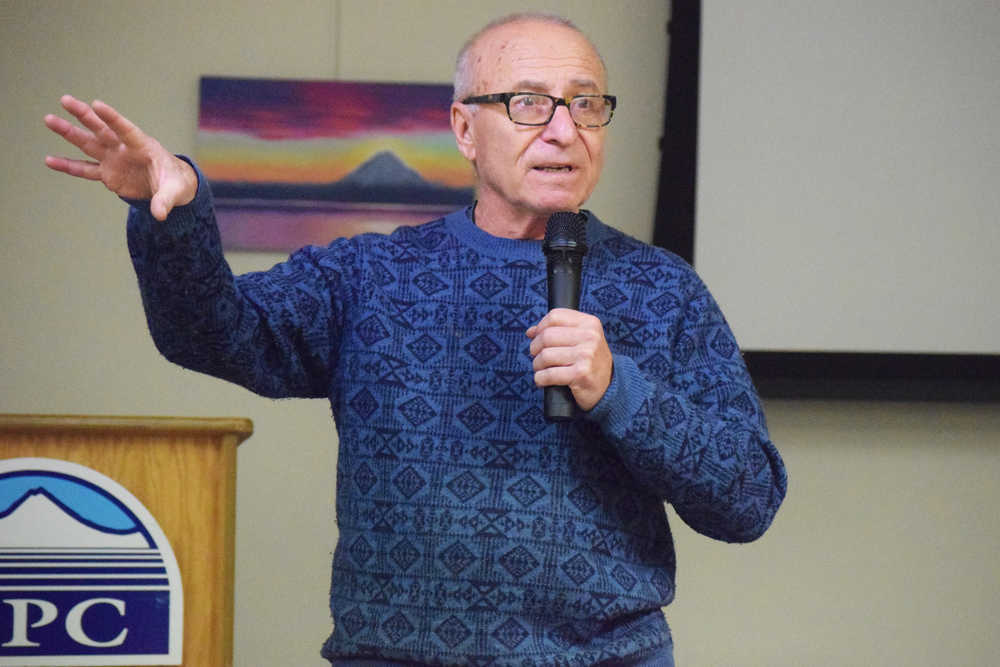 Photo by Megan Pacer/Peninsula Clarion James Kari, a linguist and professor emeritus at the University of Alaska Fairbanks, speaks to a large crowd packed into the McLane Commons for a presentation on Alaska Native languages and linguistics during Alaska Native/Native American Heritage Month on Wednesday, Nov. 30, 2016 at the college in Soldotna. Kari discussed the revised second addition of "Shem Pete's Alaska," which includes hundreds of Alaska Native place names.