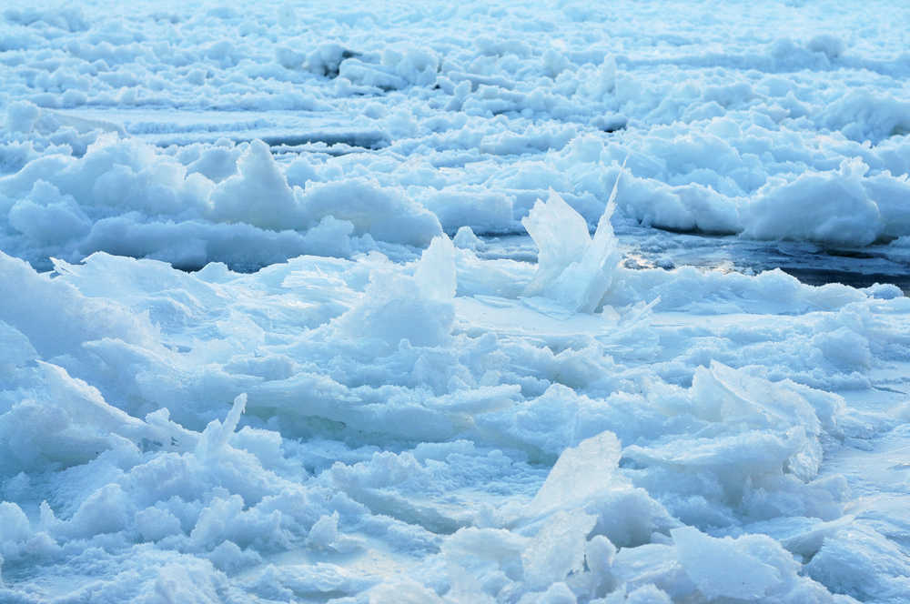 Photo by Elizabeth Earl/Peninsula Clarion Ice clogs the Kenai River near Soldotna Creek Park on Wednesday, Dec. 14, 2016 in Soldotna, Alaska. A thin rivulet of river wound its way down the center of the ice, occasionally shifting the ice enough to make an audible grinding noise. Though temperatures on the western Kenai Peninsula hung around and below zero degrees for more than a week, the National Weather Service predicts the temperature to rise into the teens and 20s with snow over the next week.