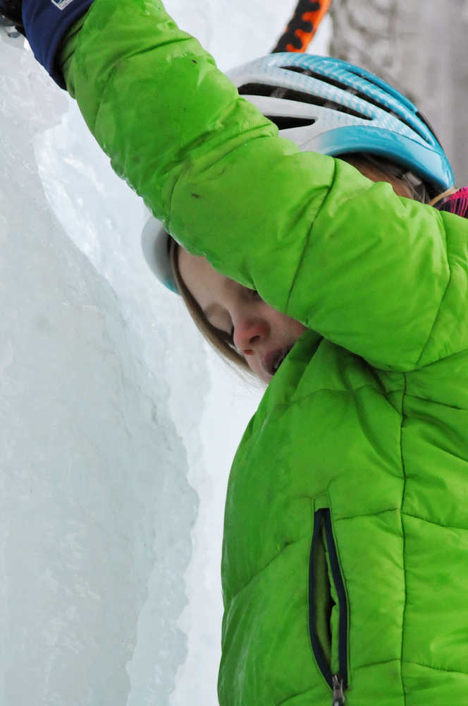 Photo by Elizabeth Earl/Peninsula Clarion Avery Walden, 9, practices climbing an ice wall her father set up in the back yard of their home on Sunday, Dec. 18, 2016 near Soldotna, Alaska. Avery and Chris Walden, along with a family friend, will embark on an eight-day expedition to summit Mt. Kilimanjaro in Tanzania. If they succeed, Avery Walden will be the youngest female ever to summit the 19,341-foot mountain.